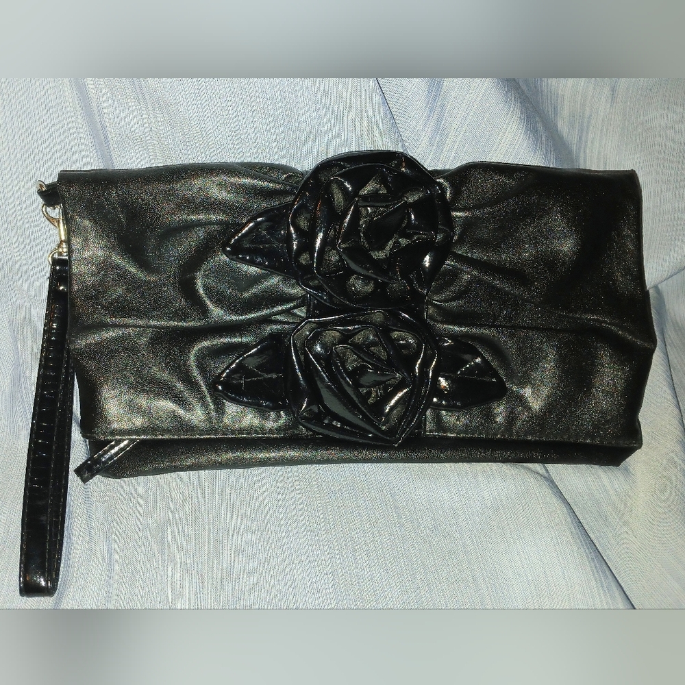 NOATD Elegant Black Clutch with Floral Design.